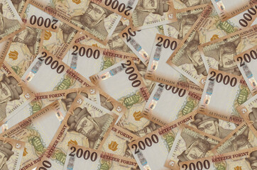 2000 Hungarian forint bills lies in big pile. Rich life conceptual background