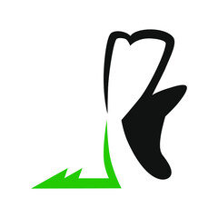 Running shoe on a grass symbol on white backdrop. Design element