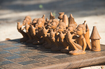 Handmade wooden chess with African symbolic and look