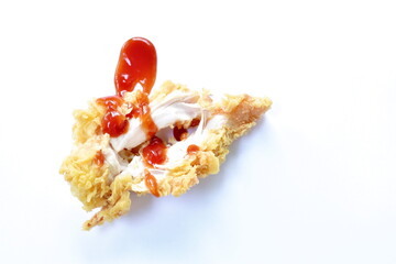 crispy fried chicken meat with bread crumb and egg yolk dressing ketchup on white background