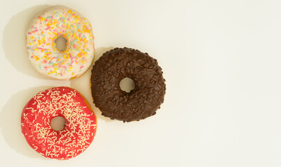 Donuts isolated on white background. Tasty glazed donuts closeup. Doughnut