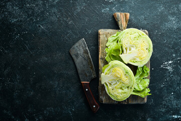 Chopped iceberg lettuce. Green healthy organic food. Top view. Free copy space.