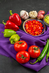 front view fresh vegetables with pepper and garlic on a dark background salad ripe meal color