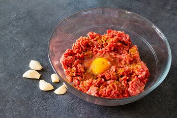 Raw minced meat in bowl