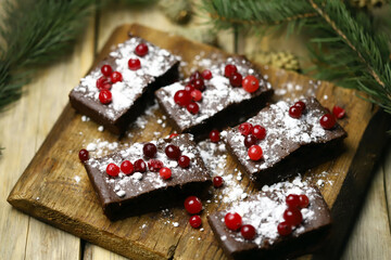Chocolate Christmas cakes with cranberries.