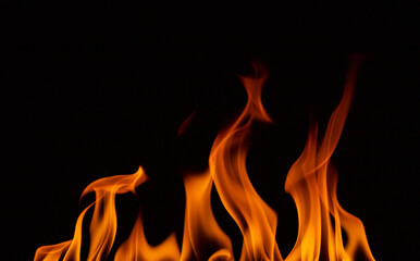 The flame were burning, the heat was hot, Black background