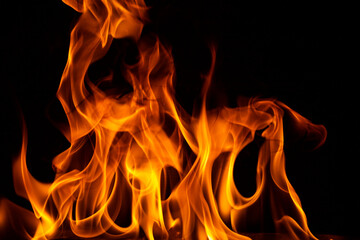 The flame were burning, the heat was hot, Black background