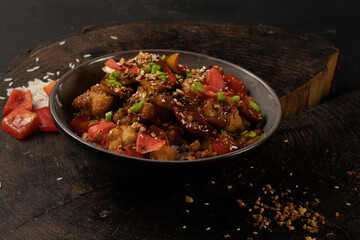 Teriyaki chicken. Chicken thigh, teriyaki sauce, rice, pepper, ginger, garlic. A spicy Asian dish of rice and poultry.