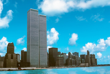 World Trade Center featured as landmark of the Twin Towers from New Jersey and Hudson River. Archival and historical cityscape of New York skyline. Manhattan in NYC, United States. Sunny blue sky. - obrazy, fototapety, plakaty