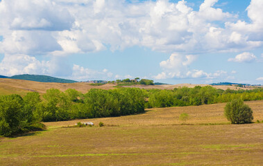 Fototapeta na wymiar The late summer landscape around Buonconvento in Siena Province, Tuscany, Italy 