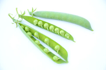the ripe green peas isolated on white background.