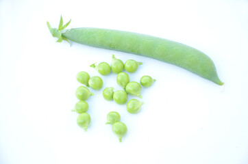 the ripe green peas isolated on white background.