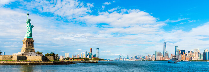 Statue of Liberty National Monument with Manhattan skyline, New York.