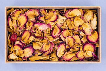 Dry rose petals flowers in a box