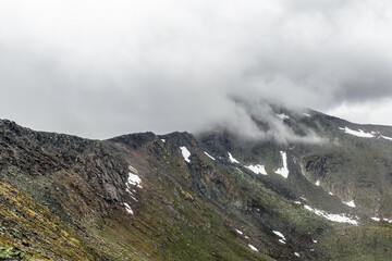 mountain peak in the clouds on a cloudy day