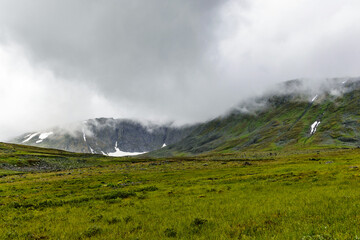 valley and mountains in the subpolar urals on a summer day