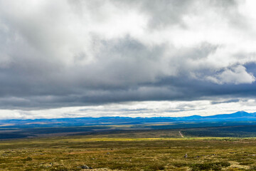 Fototapeta na wymiar northern tundra and the mountain range on a summer day