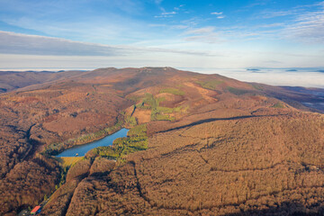 Hungary - Matra mountains with Csori-reti water reservoir from drone view