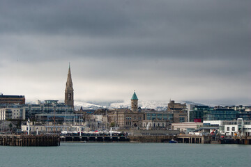 Dun Laoghaire town, bay, with snowed hills in background Ireland, Europe