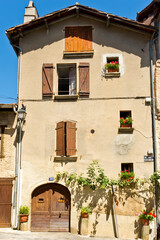 Colourful window shutters, France