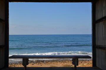 Bench emoty without anybody on sea coast