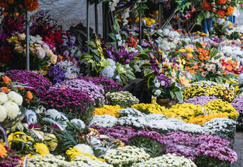 Stand with flowers on Wolski Cemetery just before All Saints Day in Warsaw, capital of Poland