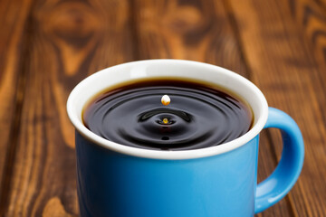 cup with coffee and milk