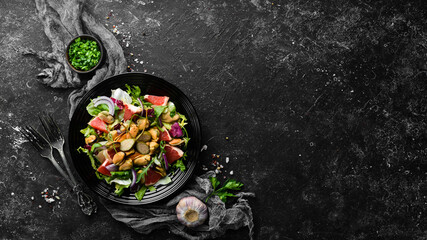 Salad with mussels, grapefruit and vegetables. Top view. Free space for your text.