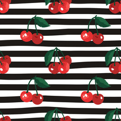 Vector seamless summer pattern with cherries on black and white striped background.