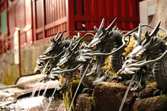 Nine head dragon statue water server at hand washing place of Kuzuryu Jinja Shrine Shingu at Hakone Kanagawa Japan. Chozuya. Temizusha.