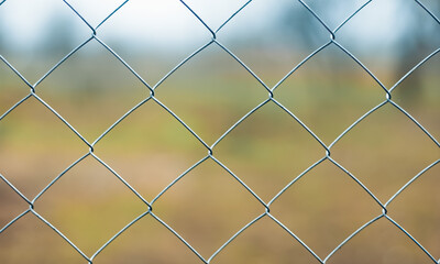 Mesh chain link background and texture. Outdoor iron covering.