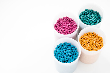 Plastic granules close up for holding,Colorful Plastic granules with white background.