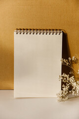 white notepad for writing. cardboard and paper. blank background