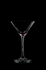 
Small glass for cocktails on black background