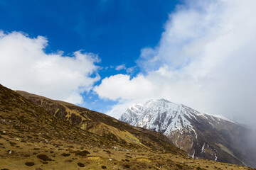 Low cloud cover on the mountain peaks of the Himalayan Mountains.