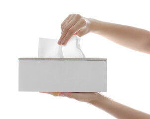 Woman taking paper tissue from holder on white background, closeup