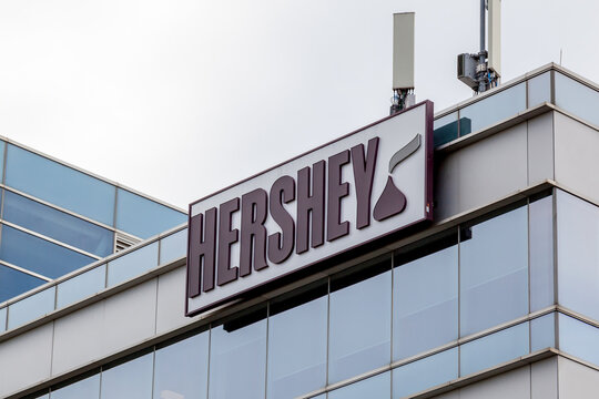 Mississauga, Ontario, Canada- August 25, 2018: Sign of Hershey on the building of Hershey Canada in Mississauga, an American company and one of the largest chocolate manufacturers in the world.