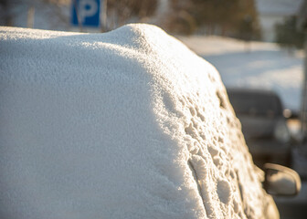 Parked car covered with snow. Transportation, winter, weather, vehicle concept.
