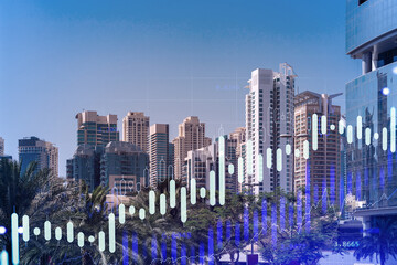 Panoramic view of steel and glass skyscrapers of Dubai Marina. Modern cityscape of the capital of the UAE. Financial services hub. FOREX graph and chart concept. Double exposure.