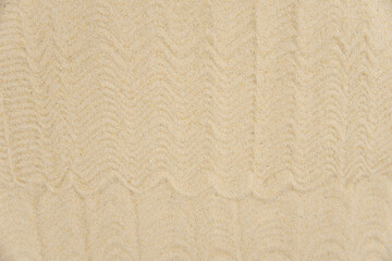 Zen sand garden meditation stone background with copy space. Stones and lines drawing in sand for relaxation. Concept of harmony, balance and meditation, spa, massage, relax. Set Sail Champagne color