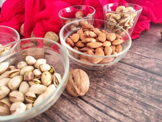Mixed nuts bowls and a red kitchen towel