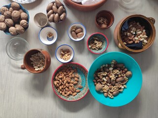 mixed nuts in mixed bowls