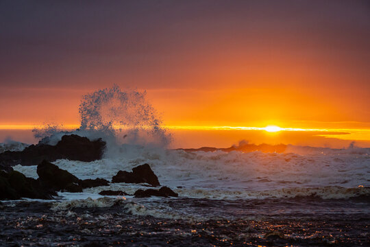 waves break at sunset on north coast northern ireland