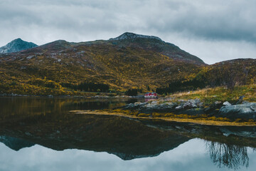 Fototapeta premium Norway, Lofoten island, landscape in late autumn with mountains and lake