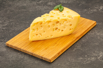 Maasdam cheese - yellow triangle with holes