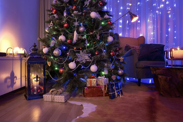 Christmas decorated luxury room with candle lights , gifts and Christmas decorated tree