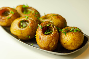 Mini jacket potatoes with a fragrant garlic butter infused with Italian truffle oil