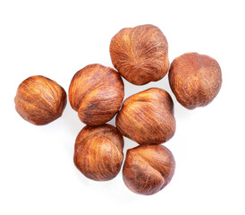 Hazelnuts heap isolated on white background. Hazelnuts Top view. Flat lay.