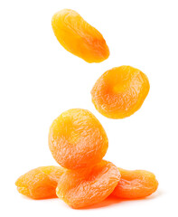 Dried apricots fall on a bunch on a white background. Isolated