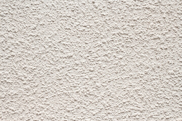 light gray textured empty background, large rough plaster on the wall
